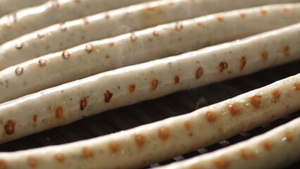 Juicy Weisswurst Sausages with Grill Marks. Selective focus, close-up.