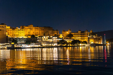 Fototapeta premium new modern architecture buildings at the banks of lake at night