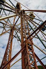 Rusting Ferris Wheel in Abandoned Theme Park, Low-Angle View