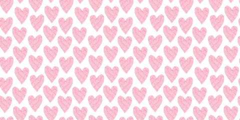 Cute seamless pattern with bright pink hand drawn textured hearts on white background. Lovely vector texture with pastel candy color doodle heart shapes for St. Valentines wrapping paper, textile