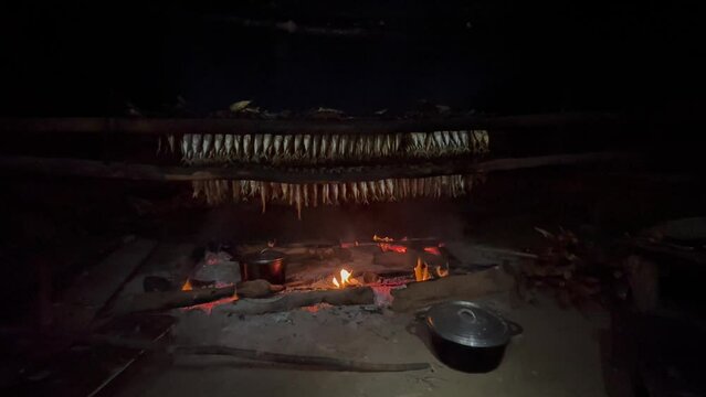 Making smoked fish in a very simple way in Masoala village, Madagascar.