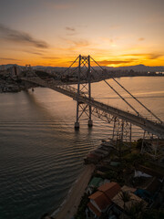 beautiful sunset on the Hercílio Luz bridge, in Florianópolis, Santa Catarina. Overlooking the mainland of the city