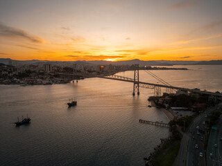 beautiful sunset on the Hercílio Luz bridge, in Florianópolis, Santa Catarina. Overlooking the mainland of the city