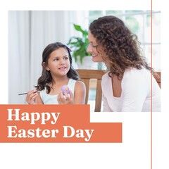 Composition of happy easter day text over caucasian mother and daughter colouring eggs