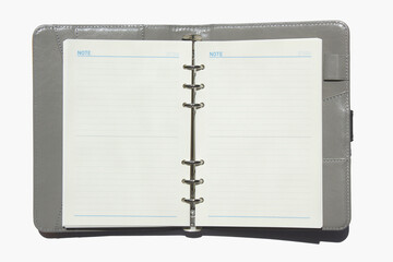 Open diary, planner or notebook. Office and business supplies for lists, reminders, schedules or agendas.