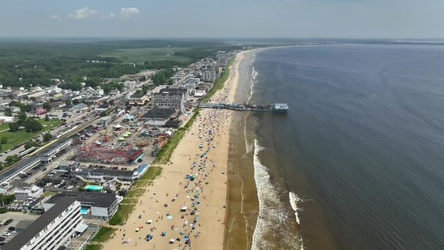 Aerial shot of the Old Orchard Beach crowded during spring break in Maine.