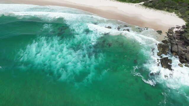 Aerial footage of the Hastings Point Lookout and the sandy beach of Hastings Point town, Australia