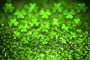 St. Patrick's Day greeting card design with clover leaves, bokeh effect