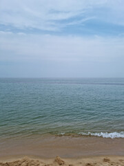 Fototapeta na wymiar Blue sky and seaside beach.
