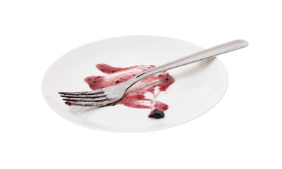 Dirty plate and fork on white background