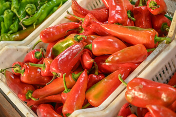 fresh red peppers at the local vegetable market 1