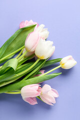 Bouquet of beautiful tulips on purple background. International Women's Day