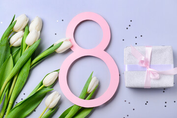 Figure 8 with gift box and beautiful tulips on lilac background. International Women's Day