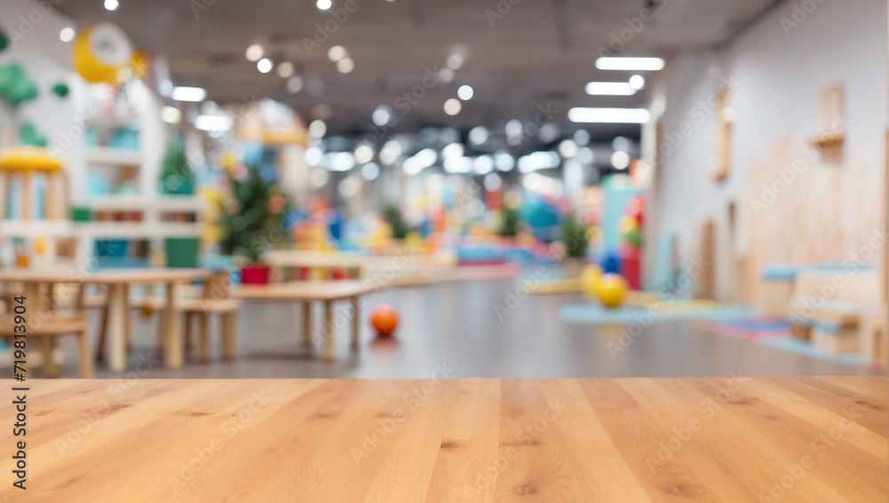 Wall mural empty wooden table for product display with indoor playground background