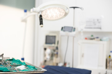 Photo show surgical room in veterinary hospital equipped with modern apparatus and equipped with necessary tools. Everything is ready for the treatment of patients and provision of urgent medical care