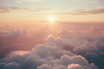 A close-up view about sea of clouds, shot from above, with sunrise and encouraging people feel uplifted atmosphere... - obrazy, fototapety, plakaty