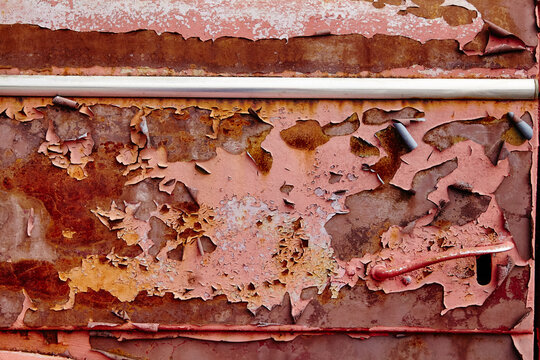 Rust and Peeling Red Paint on Metal Texture, Eye-Level Detail