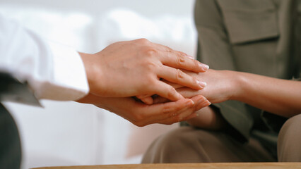 Supportive and comforting hands cheering up depressed patient person or stressed mind with empathy....