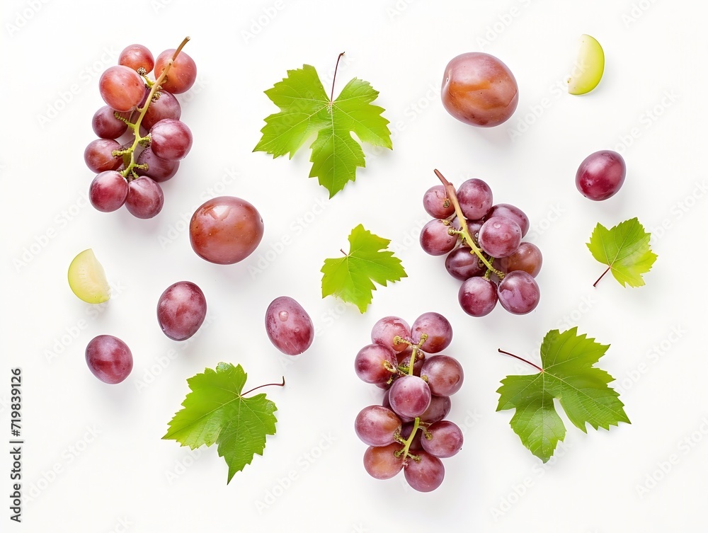 Aufkleber Red grapes with green leaves and half sliced isolated on white background. Top view. Flat lay. Grape pattern texture background. : Generative AI