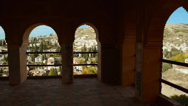 The Alhambra Palace - The Albaicin, Albayzin district of Granada, Andalucia, Spain framed by the Tower of the Ladies at Partal Palace