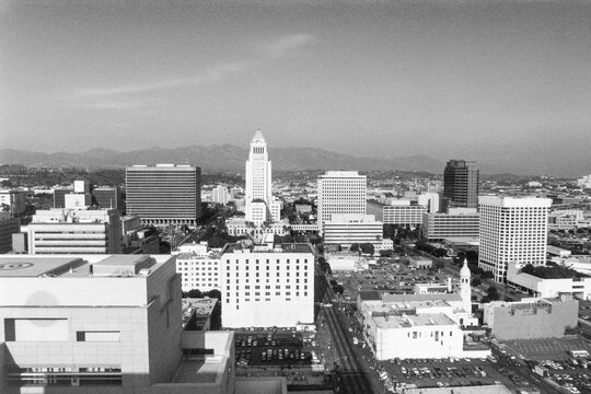Grainy archival black and white view of Los Angeles city hall and nearby buildings.  Shot on film in November 1992  