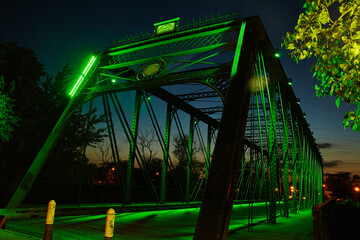 Green-Lit Truss Bridge Twilight, Urban Night Design