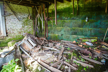Abandoned Workshop Decay with Moss and Debris, Eye-Level View