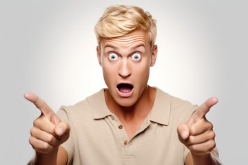 handsome blond man with bristle, looking surprised pointing himself, 