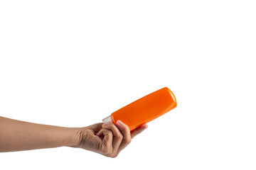 Shampoo bottle in hand isolated on transparent background