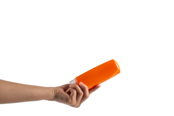 Shampoo bottle in hand isolated on transparent background