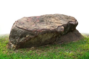 stones on a green lawn background