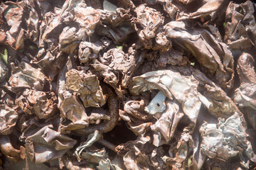 Weathered iron wall with seamless background of iron products