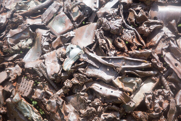 Weathered iron wall with seamless background of iron products