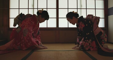 Japan, women or bow in kimono for greeting in tea ceremony or Chashitsu room for custom tradition....
