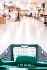 Empty cart point of view at the store market buying food and articles - defocused interior with products and meal - lockdown and quarantine or economy crisis concept