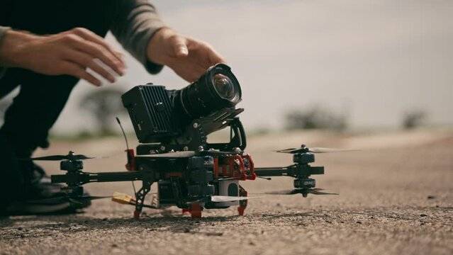 FPV drone with a mirrorless camera on the ground