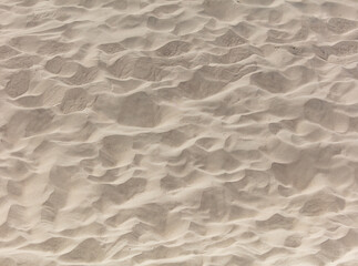 White sand in the desert as an abstract background. Texture