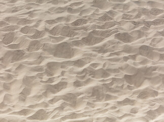 White sand in the desert as an abstract background. Texture