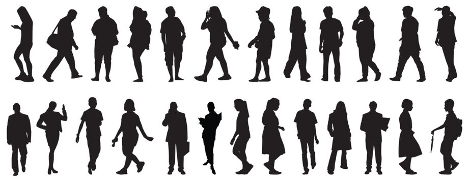 silhouettes of group of people walking and syanding.