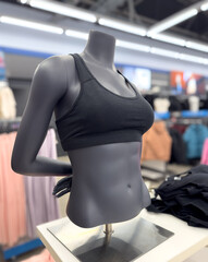 Fototapeta premium Black women's T-shirt on a mannequin in the marke