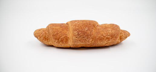 Croissant close up on white background isolated.