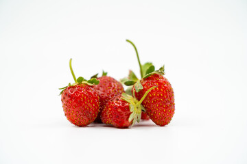 Strawberry close up on white background isolated.