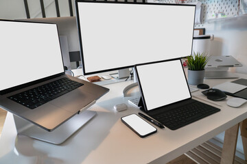 Clean empty screen displays. Graphic designer studio.