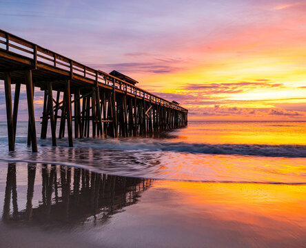 Sunrise and Wooden Pier on Fernandina Beach, Amelia Island, Florida, USA