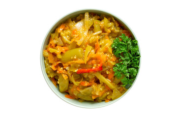 Stewed vegetable salad in a bowl on a white background. Healthy vitamin food. Natural vegetables.