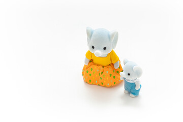 Animal doll isolated on white background. Miniature dollhouse toy. Kids toy. Animal character. Play and learn. Kids room. Childhood. Kindergarten toy. Developmental toys. Bunny toys. Easter bunny.