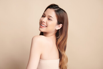 Beautiful smile of young asian woman with healthy white teeth on beige background, Dental care. Dentistry concept.