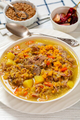 split pea and lentil soup with pork on bones