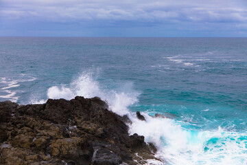 Viewpoint in Los Hervideros. Rugged lava west coast between Playa Blanca and El Golfo. Rock caves. Canary Islands, Lanzarote, Spain.