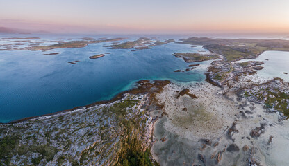 Aerial view in late evening light on a tidal area at low tide at the Norwegian coast in the vicinity of the city of Brönnöysund  © Chris